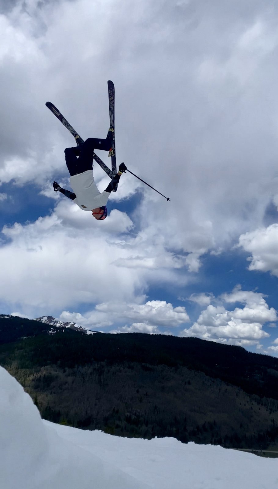Michael Booth performing a ski backflip